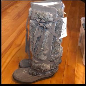 Never worn Muks boots